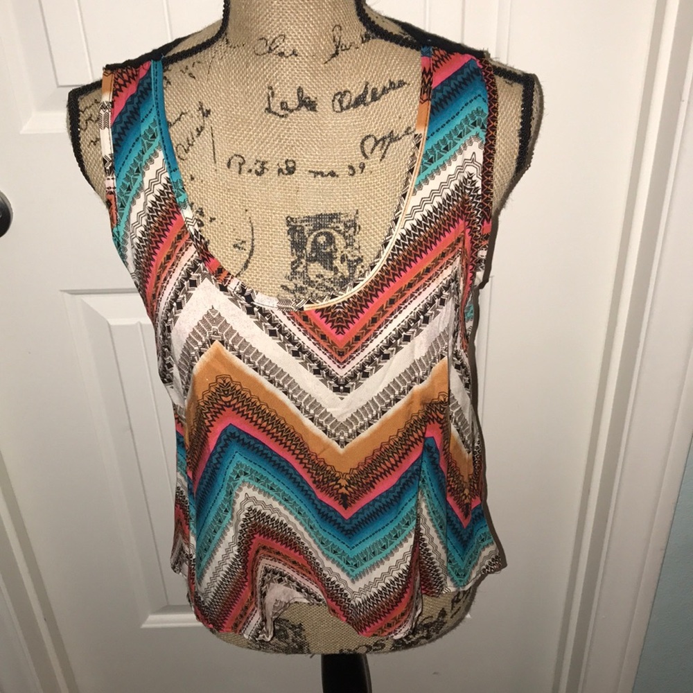 Cute sleeveless top with lace backing